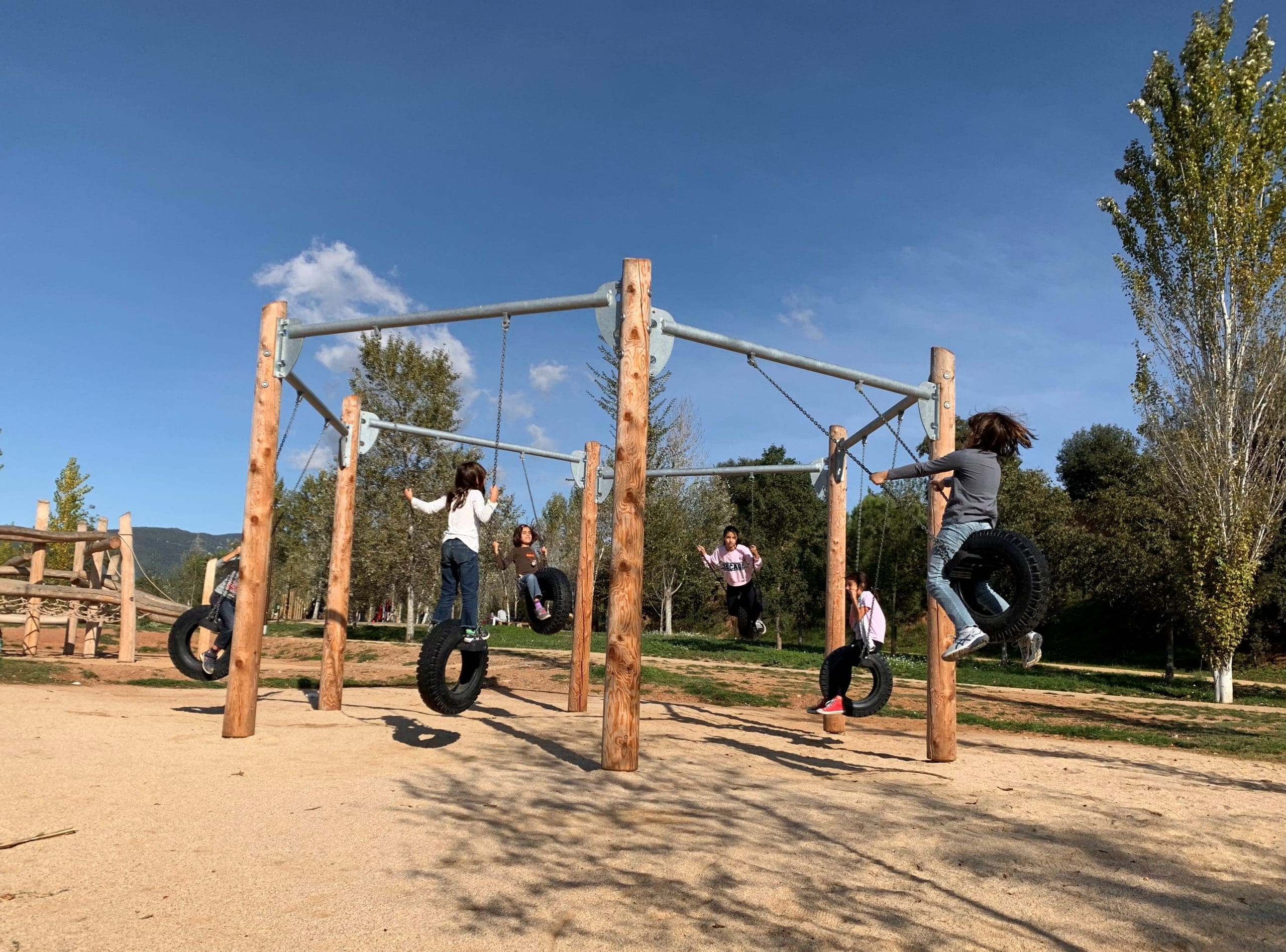 Tyre swing seats as part of the group swing known as the Hexagonal Swing